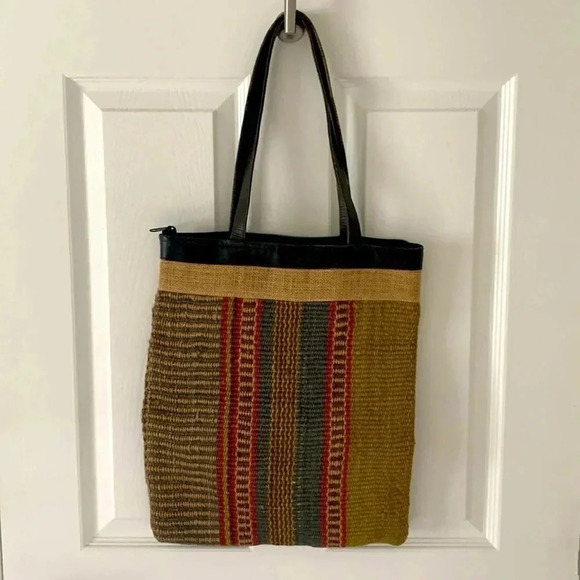 Colorful woven tote with brown leather trim and handles - Picture 1 of 6